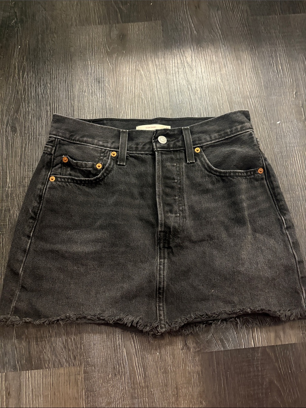 Levi's Washed Black Denim Mini Skirt with Frayed Edge